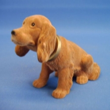 Hond voor hoedenplank